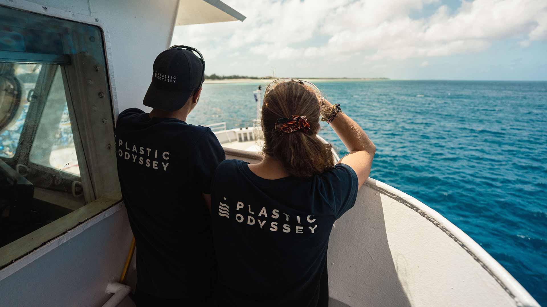 crew-looking-at-Aldabra-atoll-from-ship